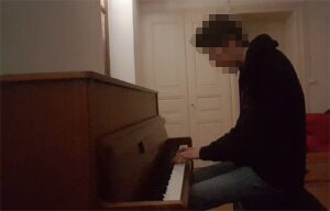 Me playing on my Zimmermann console piano